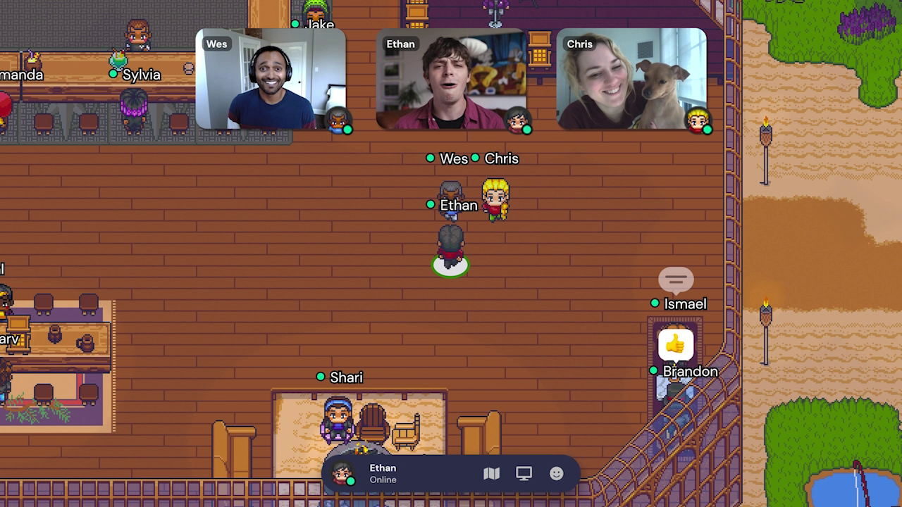 A screenshot from the Gather promo video. Three video streams display at the top of the screen for Wes, Ethan, and Chris. Beneath the video previews, their avatars are standing together in a cafe. Several other avatars are sitting at bar and at seating areas in the cafe.